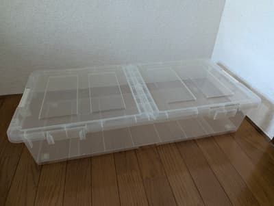 Under-bed storage box with wheels and flip lid